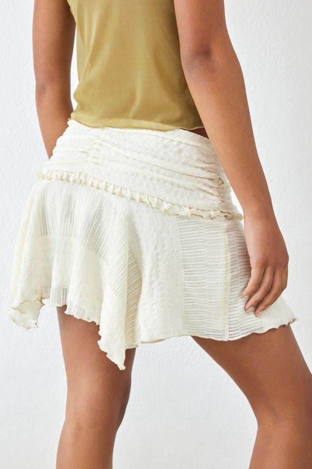 White asymmetrical shop mini skirt