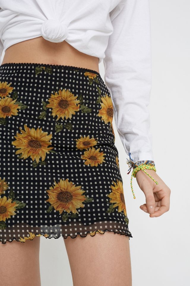 UO - Mini jupe années 90 à imprimé tournesol et carreaux #1