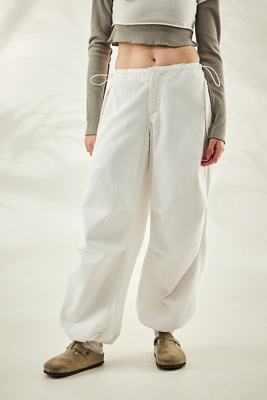 black baggy pants with white stitching