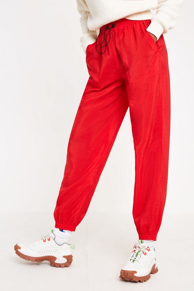 UO - Pantalon de jogging Tech rouge #1