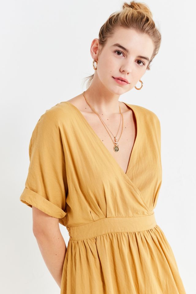 Gabrielle linen midi store wrap dress