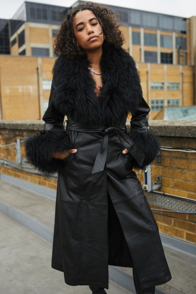 Black trench coat shop with fur collar