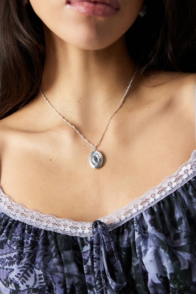 Silence + Noise Oval Entry Locket  #1