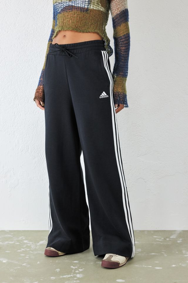 adidas Pantalones de chándal de pierna ancha negros de 3 rayas