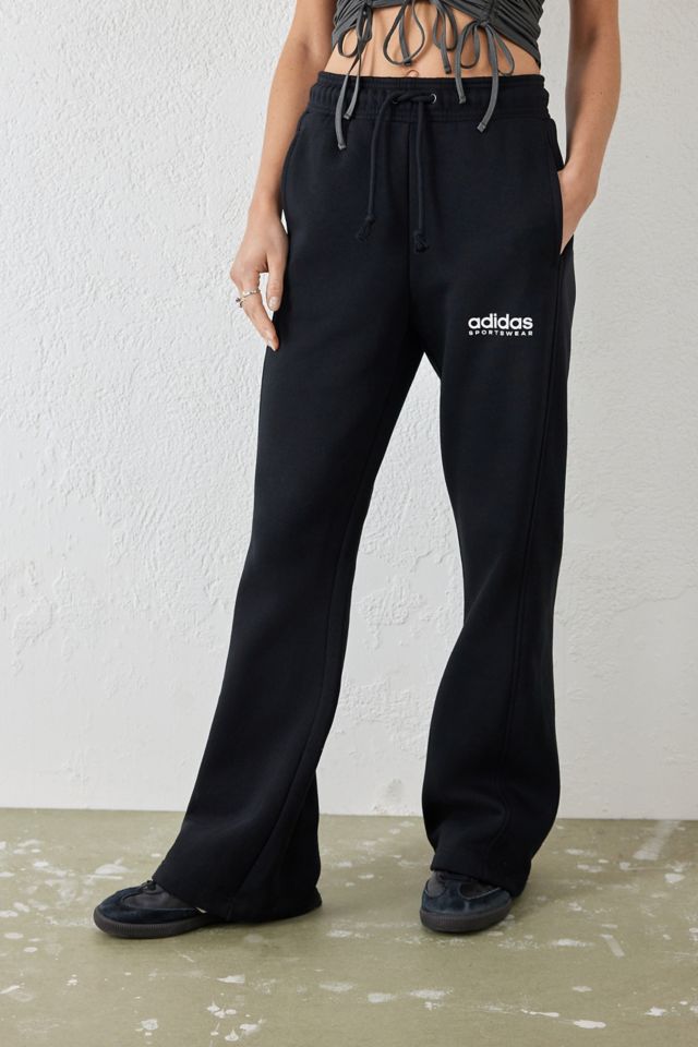 Adidas sweatpants with logo best sale on leg