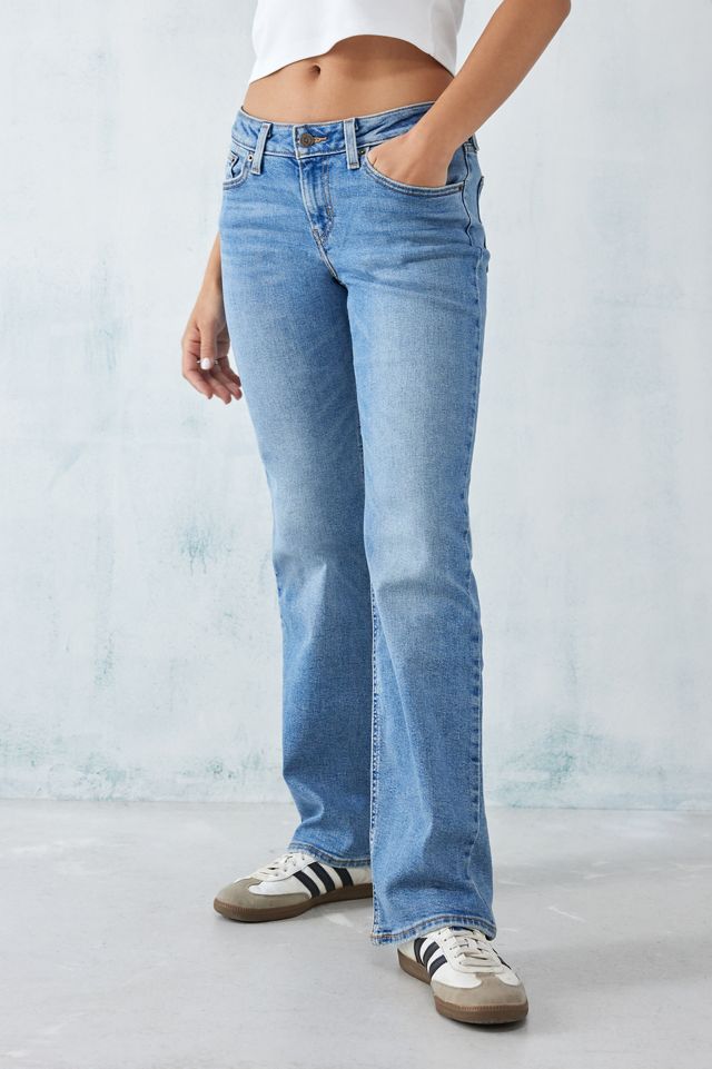 Jeans Levi's bootcut évasé super taille basse en denim délavé