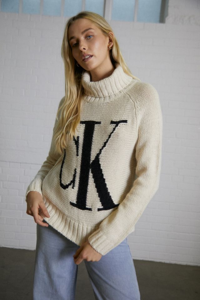 Calvin Klein Roll Neck Knitted Logo Jumper Urban Outfitters UK