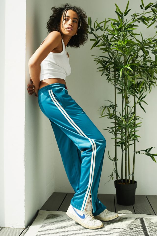 Teal track pants on sale