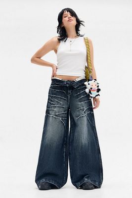 Minga London Blaue gewaschene Jeans mit Blitzdesign