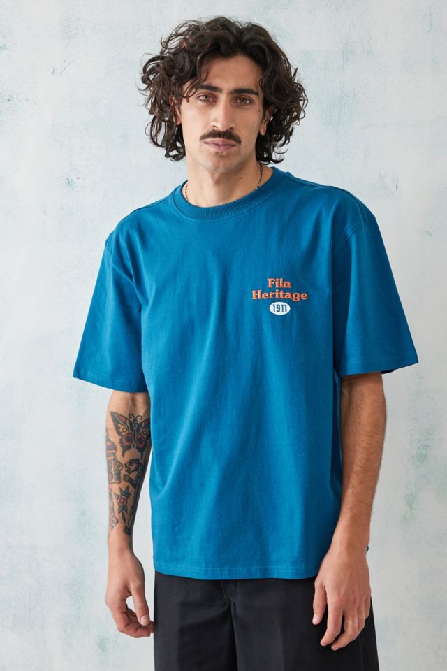 Fila t clearance shirt urban outfitters