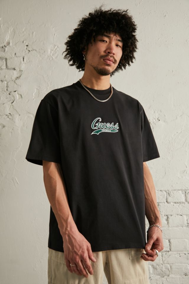 GUESS UO Exclusive Caviar Script Logo T-Shirt | Urban Outfitters UK