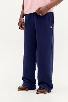 UO Exclusive Pantalons de jogging larges bleu marine en taille: Small - FILA - Modalova