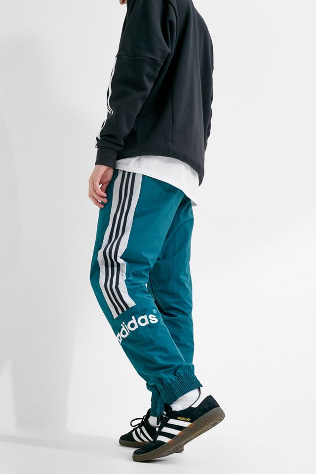 adidas – Gewebte Trainingshose „92“ in Blau mit Logos #2