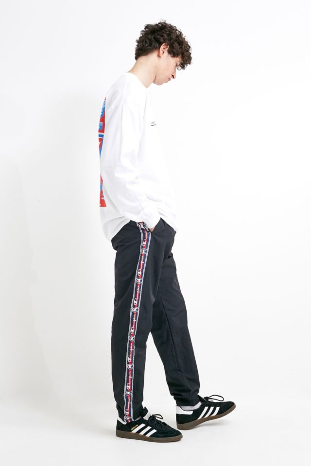 over het algemeen glas censuur Champion Logo Tape Black Nylon Track Pants | Urban Outfitters UK