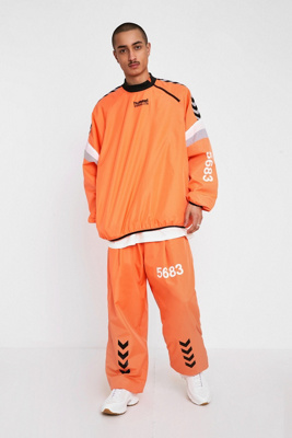 Hummel X Willy Chavarria Orange Track Pants | Urban Outfitters UK