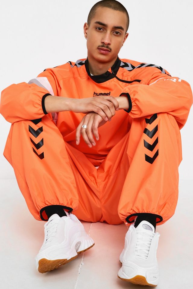 Hummel X Willy Chavarria Orange Track Pants | Urban Outfitters UK