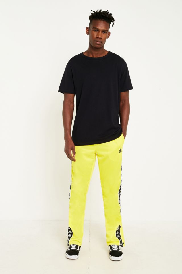 Kappa Yellow Taped Popper Track Pants | Outfitters UK