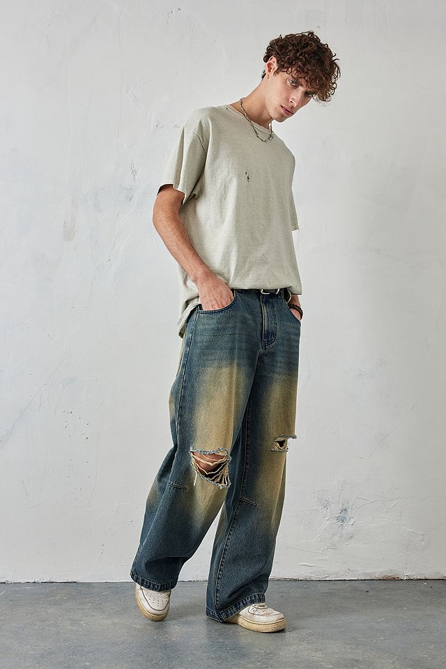 Jaded London Tinted Blue Busted Colossus Jeans | Urban Outfitters UK