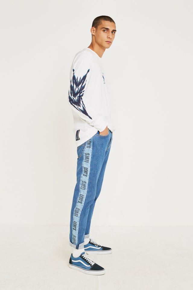 Levis logo hot sale stripe jeans