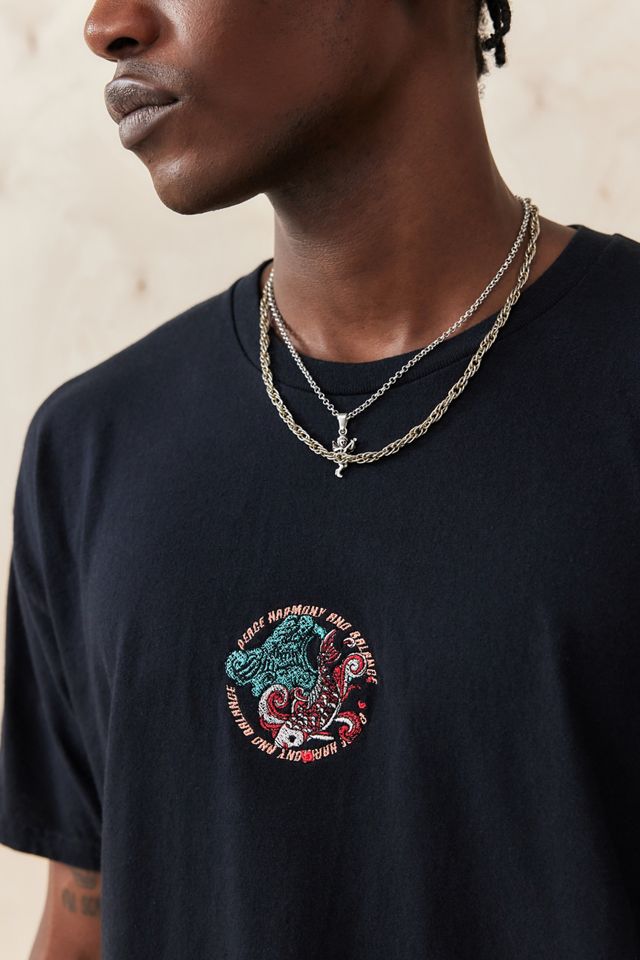 T-shirt noir brodé de poisson UO #1