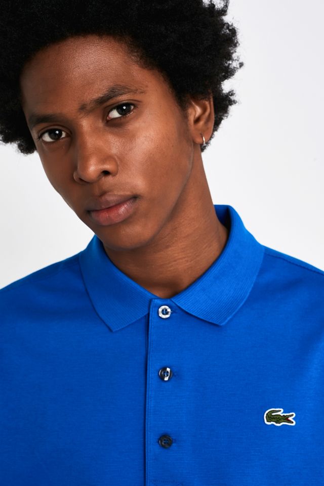 Lacoste Polo à manches courtes bleu royal Urban Outfitters FR