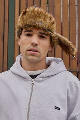 UO Karierte Braune Kunstfell Trapper Mütze