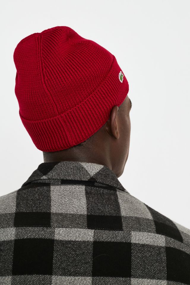 Bonnet lacoste femme rouge sale