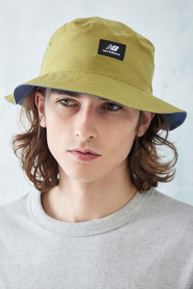 New Balance Sombrero de cubo reversible de oliva #1
