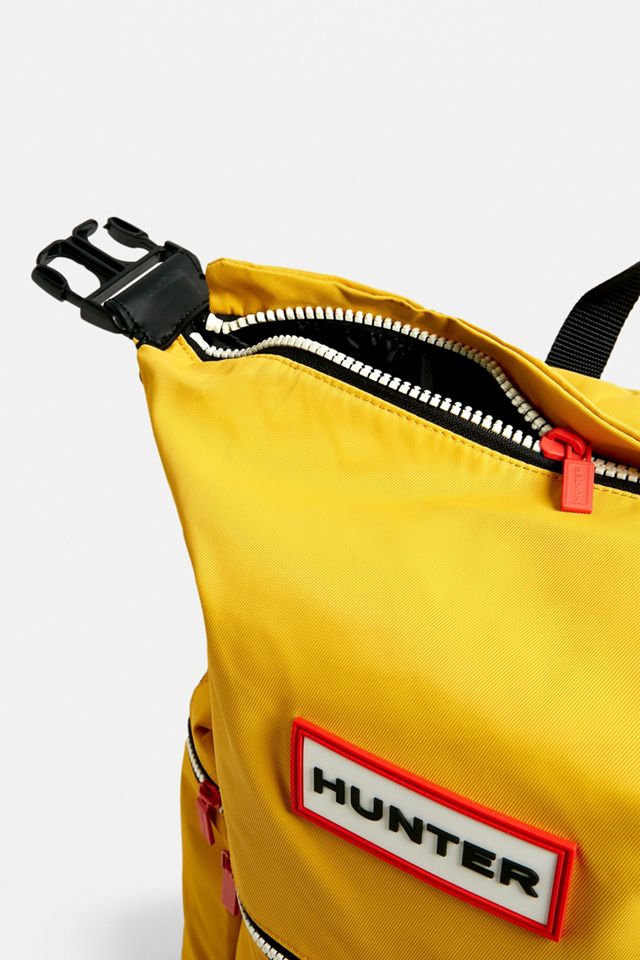 Hunter Dark Yellow Clip Top Backpack | Urban Outfitters UK