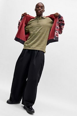 Oakley UO Exklusives Kurzärmeliges Poloshirt Ellipse in Tiefem Olivgrün