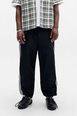 Pantaloni da Tuta in Tessuto Firebird Neri adidas Originals