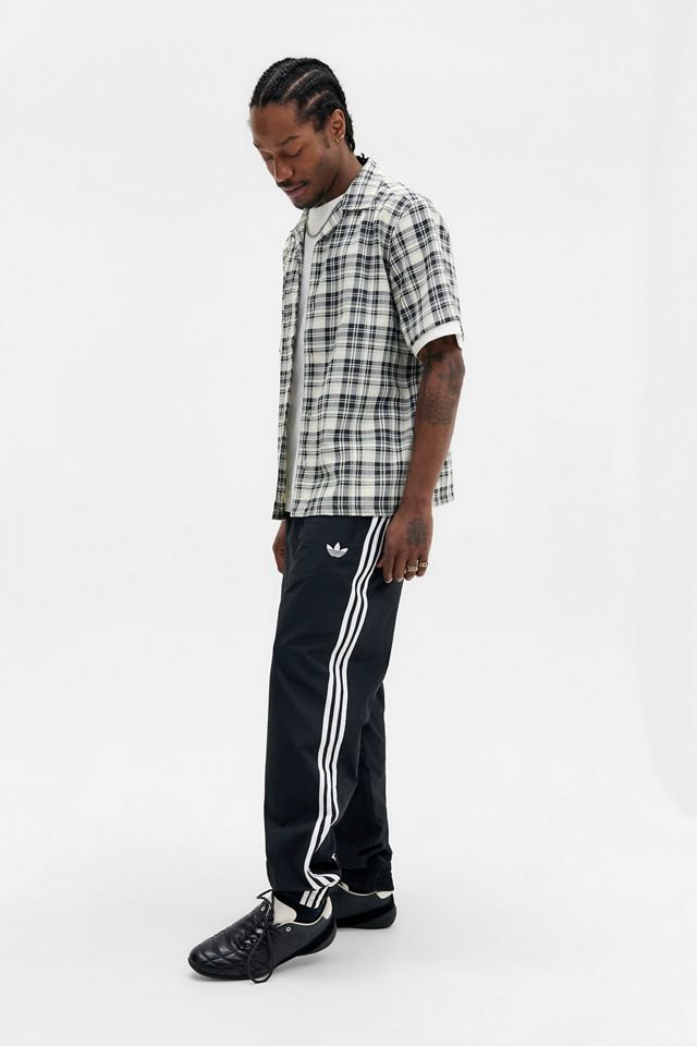 Pantaloni da Tuta in Tessuto Firebird Neri adidas Originals #1