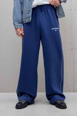 New Balance Joggers holgados de herencia lineal en azul marino