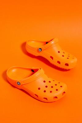 Crocs Orange Zing Classic Clogs | Urban Outfitters UK
