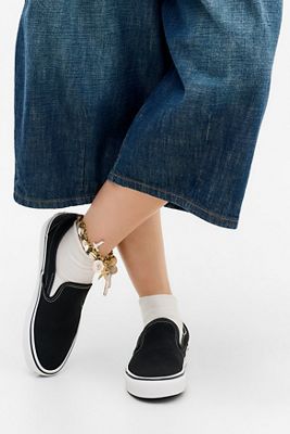 Baskets Classic Slip On Noires et Blanches Vans