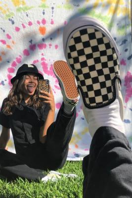 Checkerboard slip on discount vans on feet