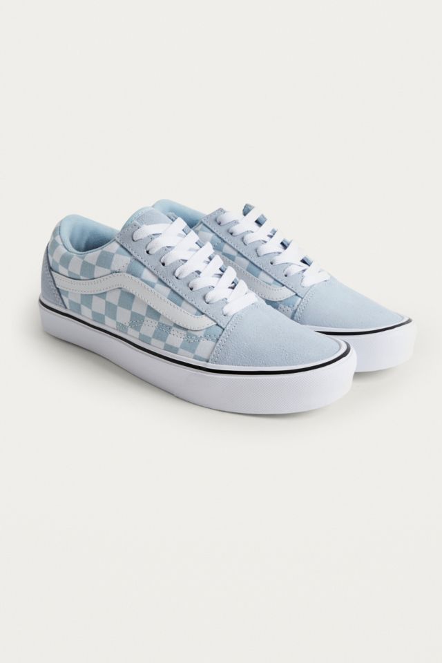 Light blue vans store with checkered rim