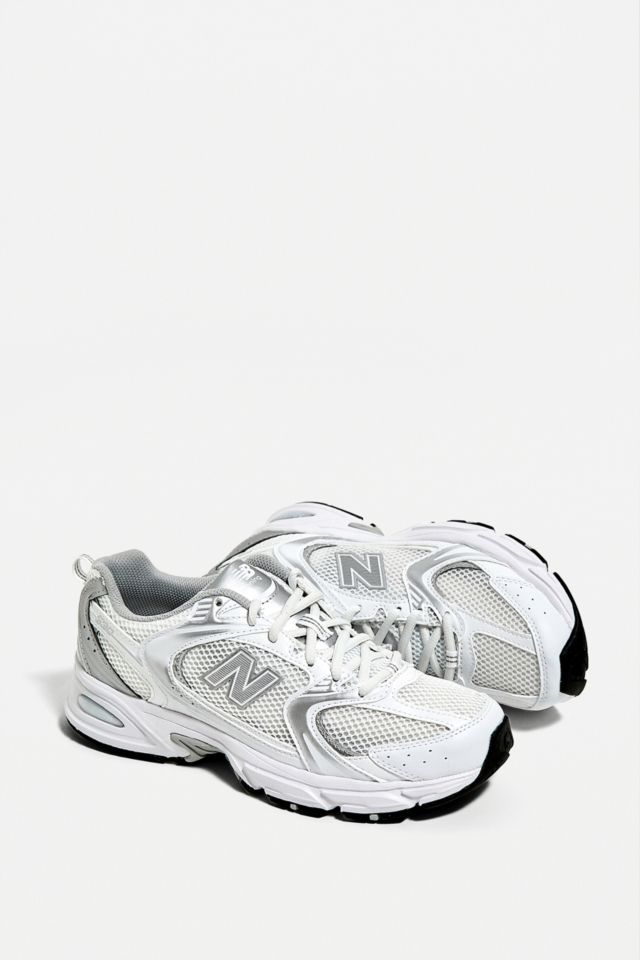 New balance white & silver sale 530 trainers