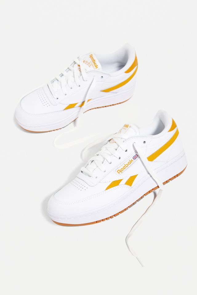 Orange and white reebok online