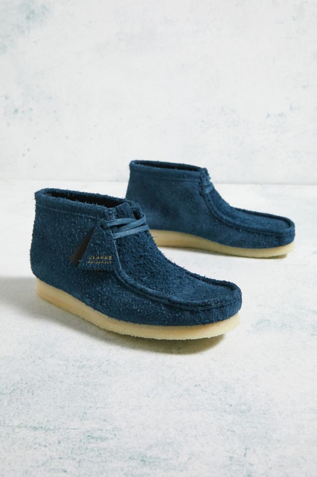 Blue store wallabee shoes