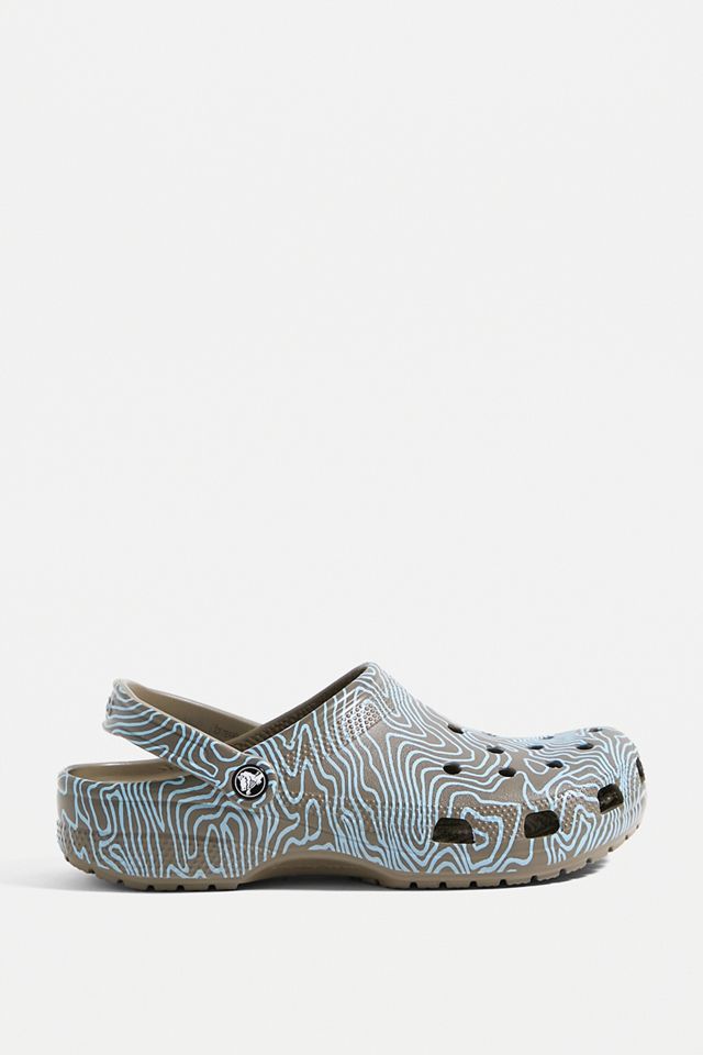 Crocs Khaki Arctic Topography Classic Clogs | Urban Outfitters UK