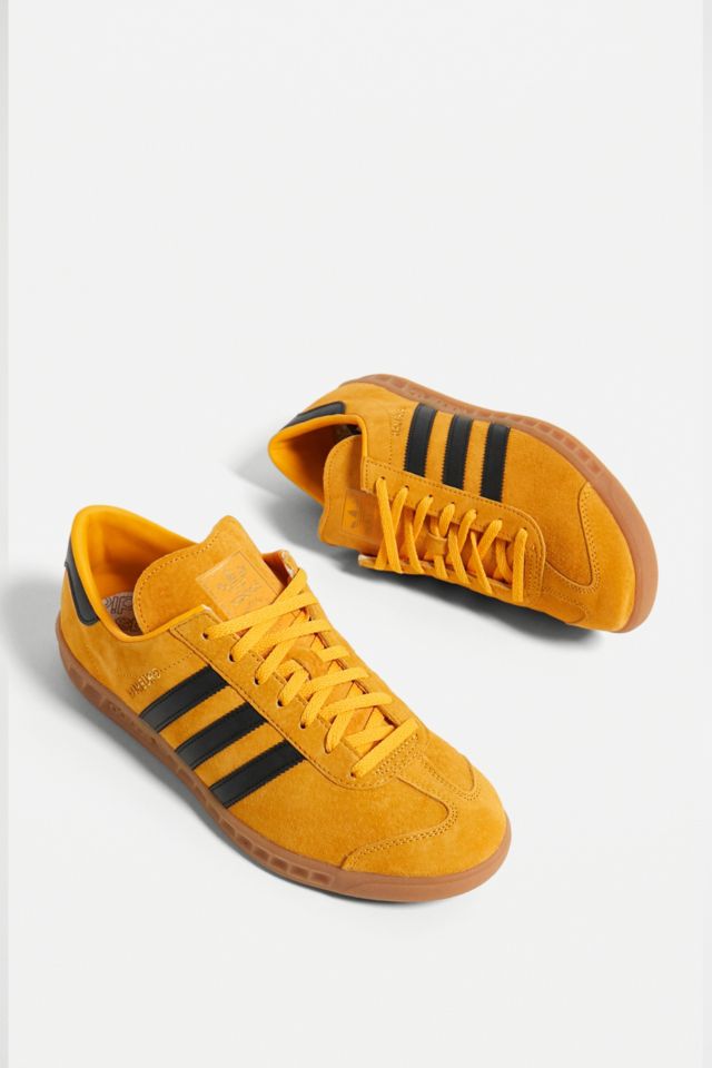 Adidas store yellow suede