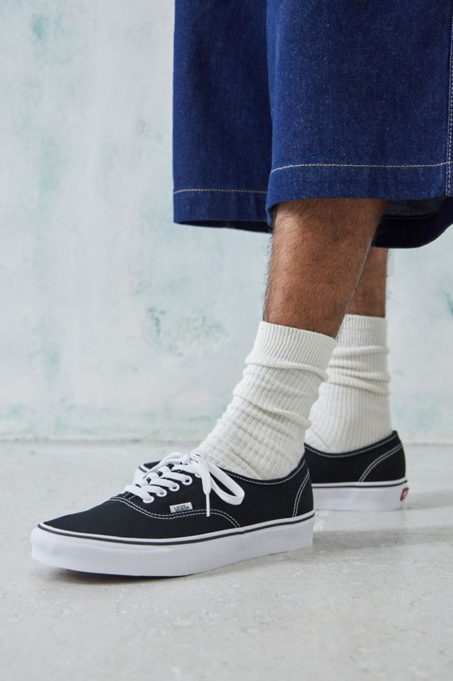 Vans authentic black and white hot sale on feet