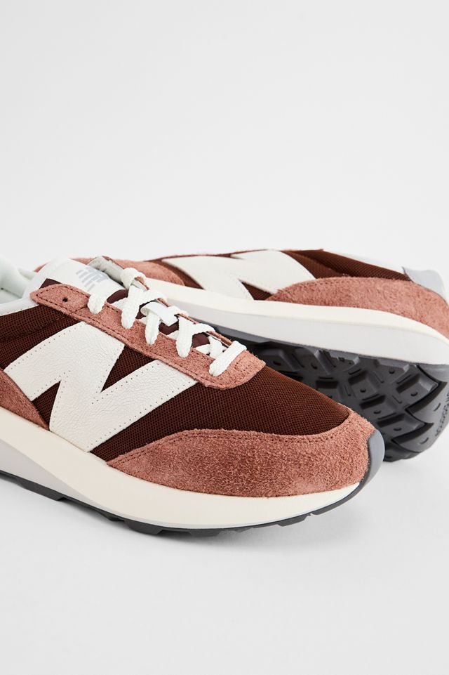 New Balance Braune 370 Turnschuhe #1