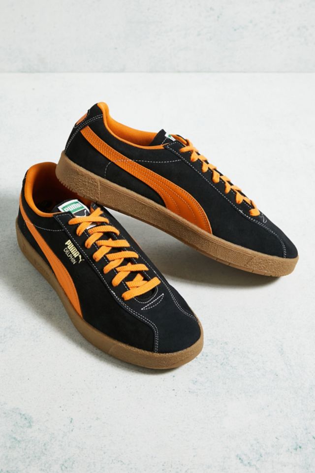 Puma black 2025 orange trainers