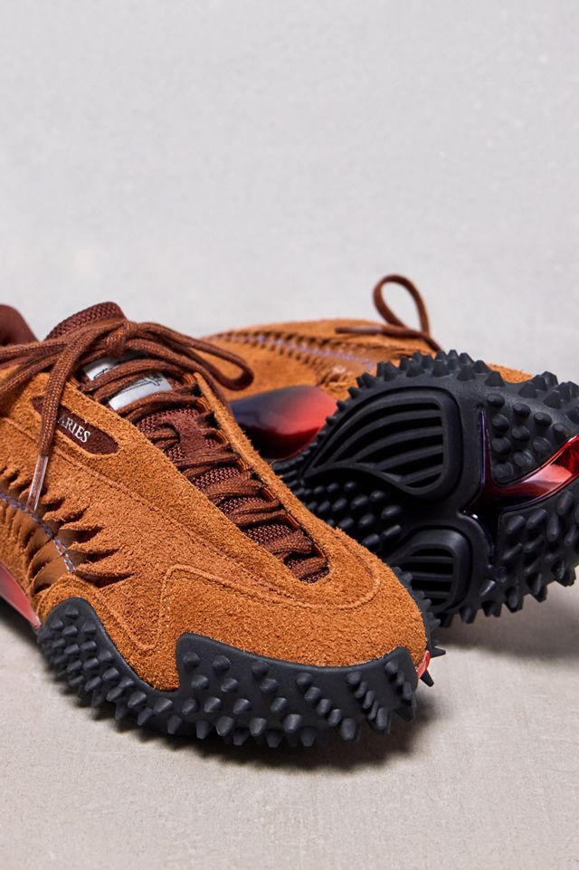 Urban Renewal One-Of-A-Kind PUMA X Aries Mostro Craft Trainers #1