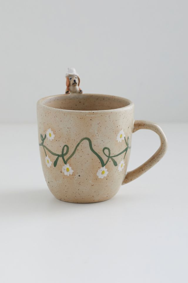 Tasse mit Hund der hervorschaut #1