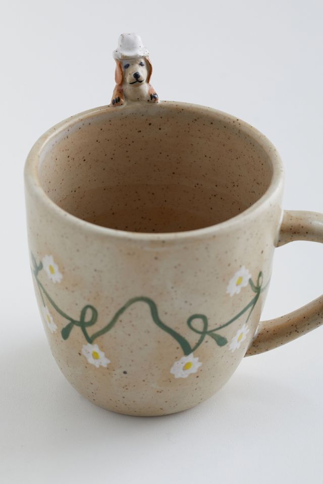 Tasse mit Hund der hervorschaut #3