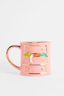 Unordentliche Kommode Tasse
