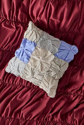 Coussin à rayures mélangées